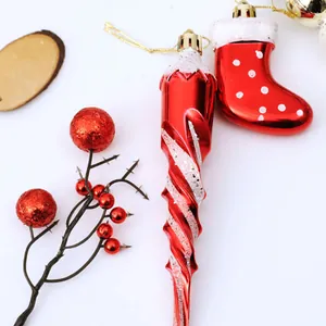 Festive red Christmas ornaments set including swirl icicle and polka dot stocking.
