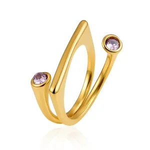 Detail shot of 18K gold plated stainless steel open ring with pink cubic zirconia