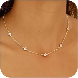 Detailed view of an elegant 18K gold-plated clover necklace with sparkling zircon