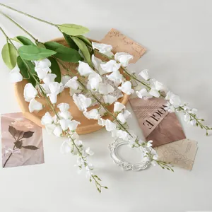 Elegant artificial long stem lily of the valley for wedding and hotel decor.