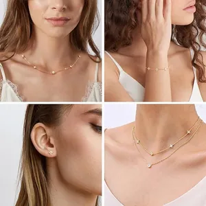 Lifestyle collage of gold four-leaf clover necklace, bracelet and earrings on model