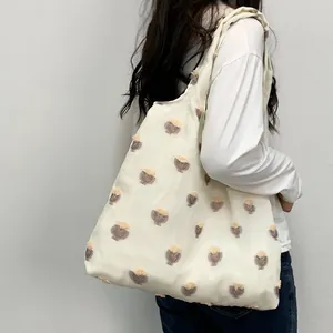 Bolso tote grande de lona blanco roto con bordados florales para el uso diario de las mujeres