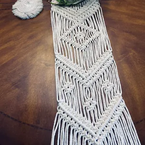 Handmade Nordic macramé table runner with bohemian woven patterns for wedding decor