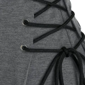 Close-up of black lacing and silver eyelets on grey slim fit hoodie