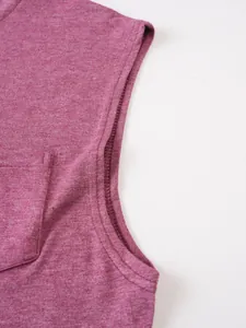 Macro view of sleeveless tank top armhole and pocket stitching on pink heather fabric