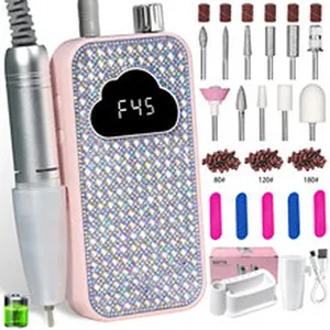 Kit fresa per unghie elettrica rosa con strass, punte e nastri abrasivi portatili.
