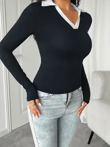 Elegant slim fit long sleeve black polo shirt with white contrast collar for women