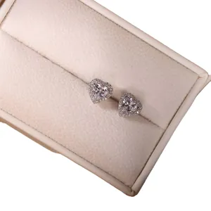 Elegant heart-shaped halo stud earrings with sparkling zircons in a gift box