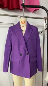 Close-up of a vibrant purple double-breasted casual loose blazer on a mannequin
