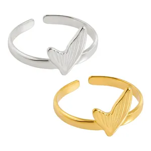 Minimalist stainless steel fishtail rings in polished gold and silver plated finish