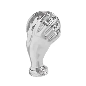 Detailed view of a creative silver hand-shaped brooch designed to hold a small bouquet.