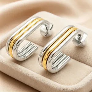 Elegant multi-layer oval hoop earrings in two-tone 18K gold plated stainless steel for women.