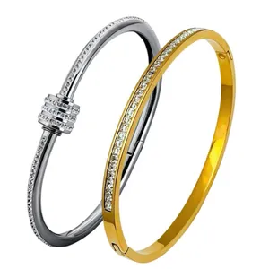 Luxury stainless steel bangles with sparkling crystals in gold and silver finishes