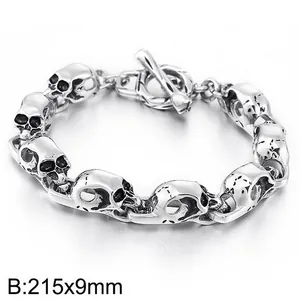 Detailed macro shot of gothic men's skull link bracelet made of durable titanium steel