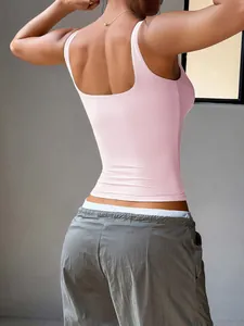 Close-up back view of a slim fit light pink Y2K yoga tank top for women's casual wear