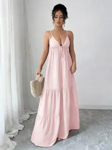 Elegant pink spaghetti strap maxi dress with tiered skirt detail