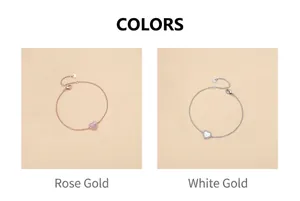 Heart-shaped pendant bracelets shown in elegant rose gold and white gold shell finishes