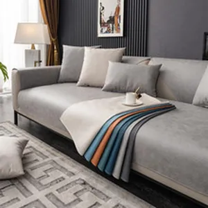 Close-up of grey chenille sofa cover featuring various colorful fabric swatch options