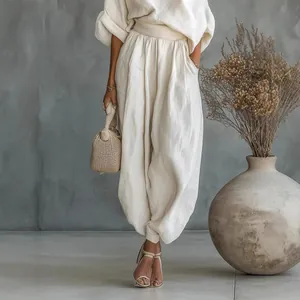 Elegant off-white linen two-piece set with loose top and lantern pants for women