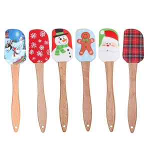 Set of 6 Christmas silicone spatulas with wooden handles for baking and cream mixing.