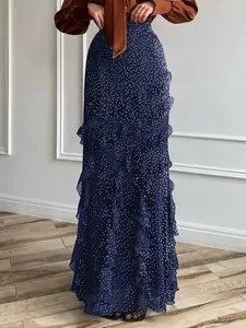 Elegant navy blue polka dot maxi skirt with ruffled layers for casual vacation wear