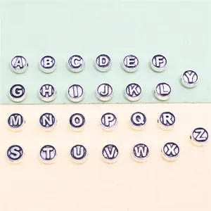 Detailed view of 26 silver alloy alphabet beads from A to Z for DIY jewelry pendant making