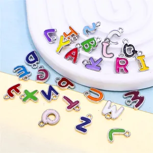 Detailed macro shot of colorful enamel alloy A-Z alphabet charms for DIY jewelry making