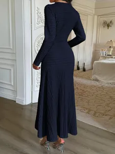 Elegant navy blue long sleeve textured maxi dress back view for women