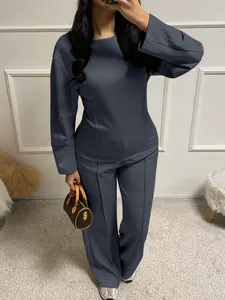 Detail view of a women's dark grey casual two-piece set featuring long sleeve top and pants