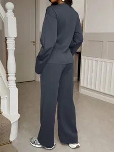 Back view of women's charcoal grey long-sleeved top and wide-leg pants lounge set