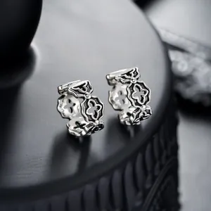 Vintage silver hollow cross ear cuffs for men and women with a non-pierced design
