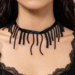 Detailed close-up of a Gothic black beaded tassel choker necklace with delicate silk band
