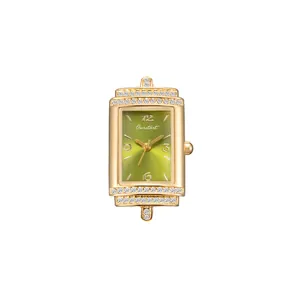 Elegant luxury gold square watch for women with a green sunray dial and diamond accents