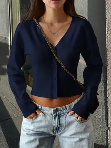 Elegant women's navy blue ribbed V-neck cardigan featuring a slim fit button down design