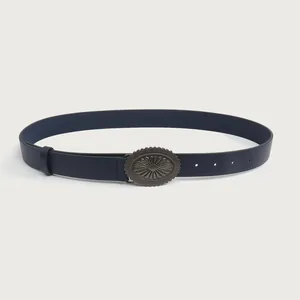 Vintage women's belt with intricate alloy floral carved buckle detail