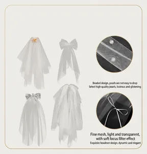 Detailed view of elegant French bridal bow veil featuring delicate mesh and pearl beads