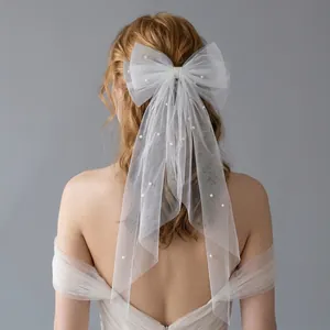 Elegant French style bridal white mesh veil with large bow and pearls hair accessory