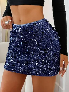 Detailed close-up of elegant royal blue sequined mini skirt with sparkling bodycon fit