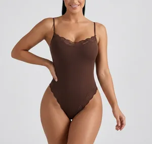 Detailed view of a brown lace-trimmed ribbed bodysuit with thin straps worn by a model
