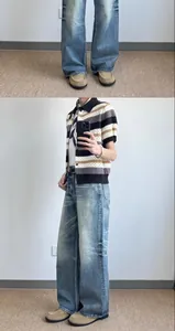 Detail view of men's retro vintage washed loose wide-leg denim jeans