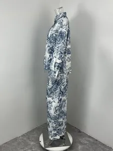 Side view of women's blue Toile de Jouy print leisure shirt and pants set on mannequin
