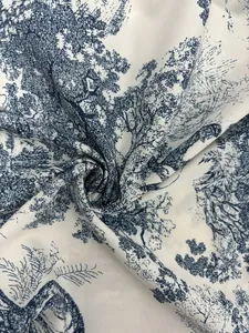 Macro view of blue pastoral landscape print on white fabric for elegant fashion shirt