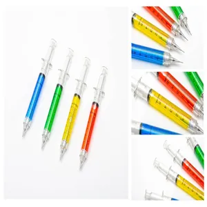 Detailed view of creative syringe ballpoint pens in multiple colors with ml scales