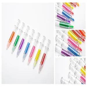 Detailed view of colorful syringe-shaped novelty pens with realistic medical scale markings.