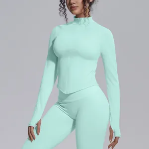 Detail view of seamless mint green sports jacket with stand collar and zipper