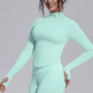 Women's seamless stand collar zipper sports jacket in mint green for yoga fitness.