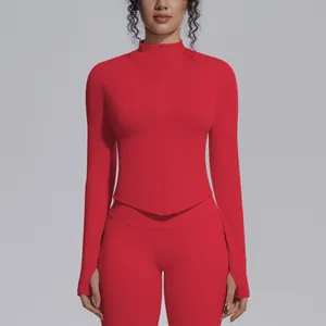 Detailed front view of a red seamless high-stretch yoga top with a stand collar and zipper