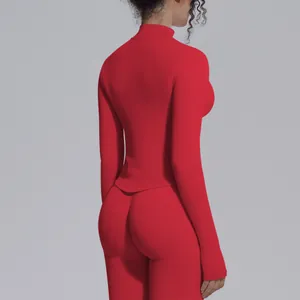 Back view of a red seamless mock neck athletic jacket showing tight fit and texture
