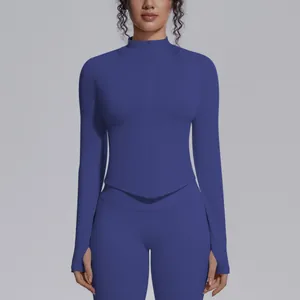 Front detail of seamless royal blue zip-up yoga jacket featuring a sleek stand collar