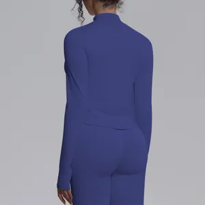 Back view of a blue seamless high-stretch long sleeve yoga top with a stand collar